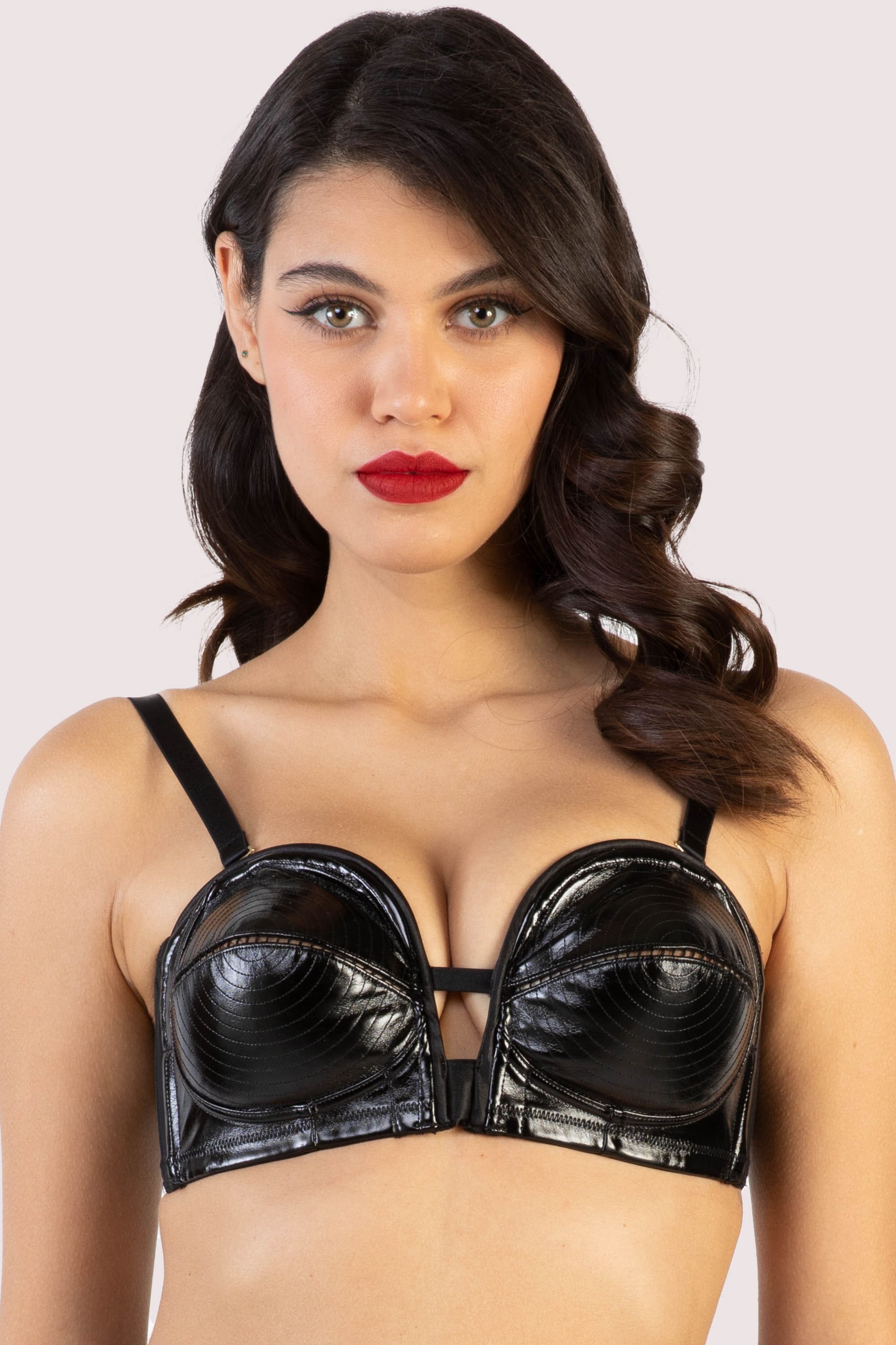 model wears Genevieve black pvc overwired bra