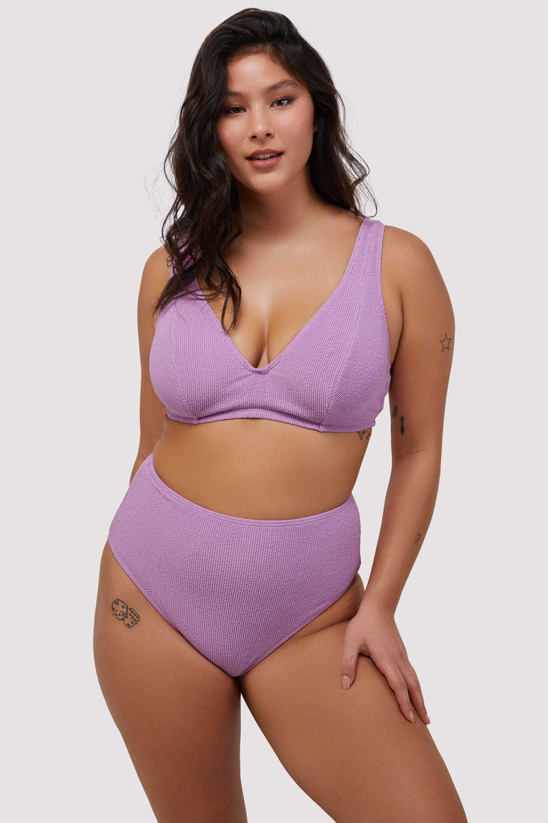 model wears lilac scrunch fabric bikini swimwear set