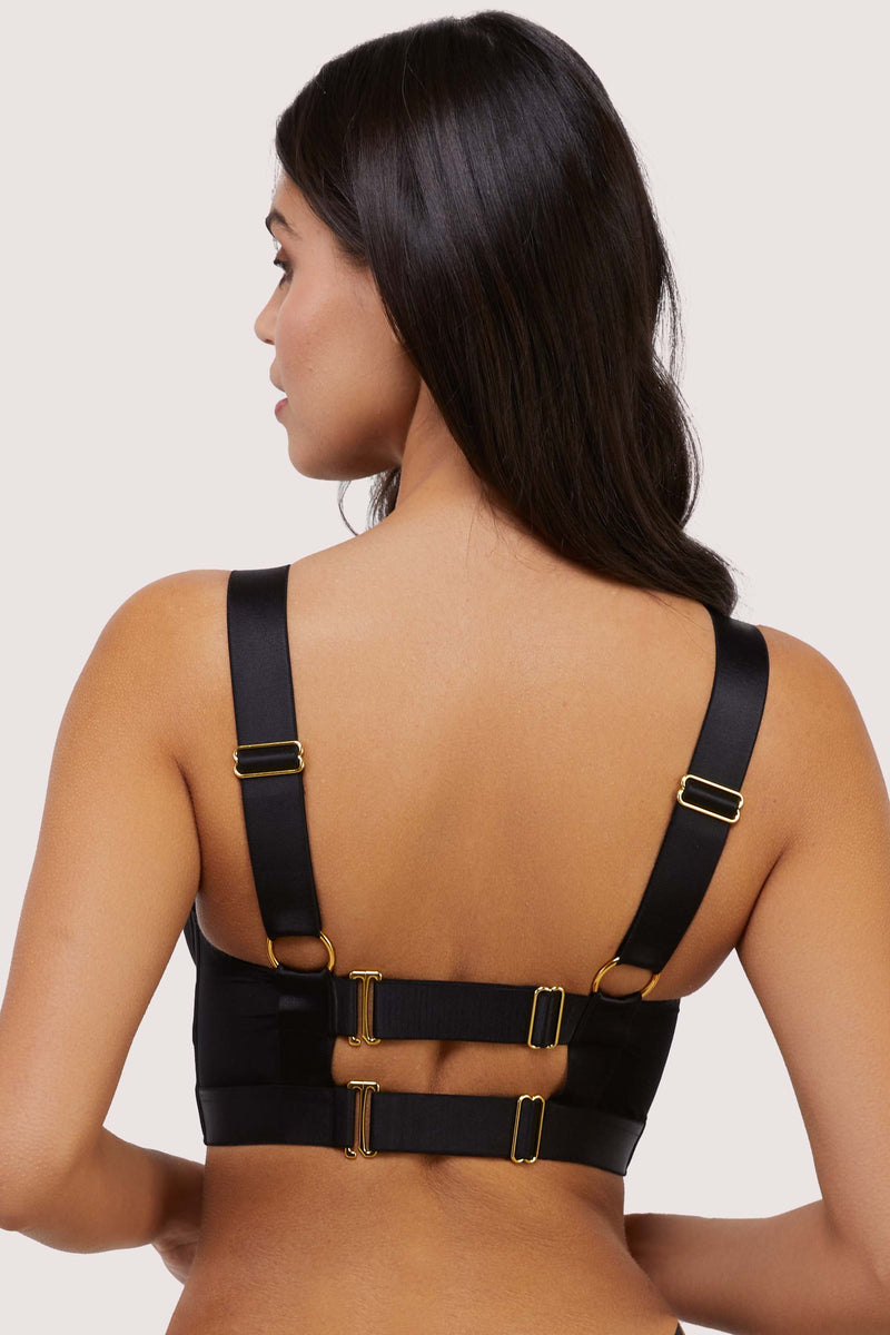 model shows black g-hook fastening harness bra back