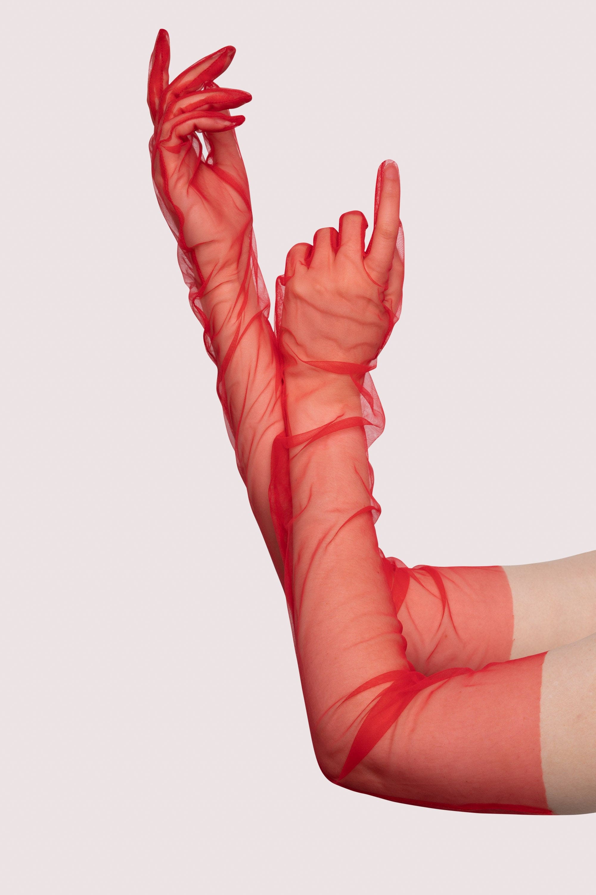 Model shows off the red sheer gloves