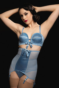 Core:model wears retro blue lingerie set with bra and girdle