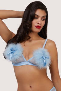 model wears blue triangle bra with feather puff and straps