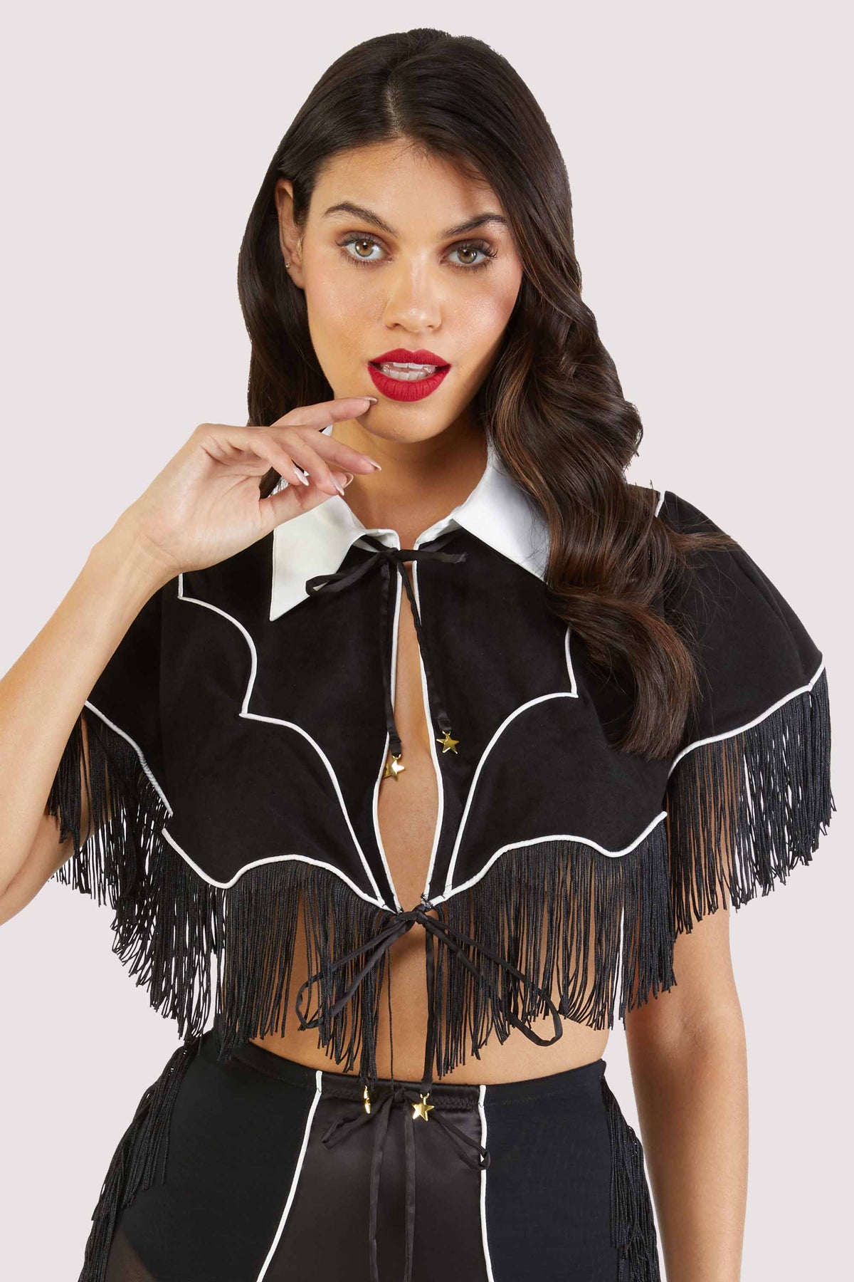 model wears Billie western cowboy fringe cape