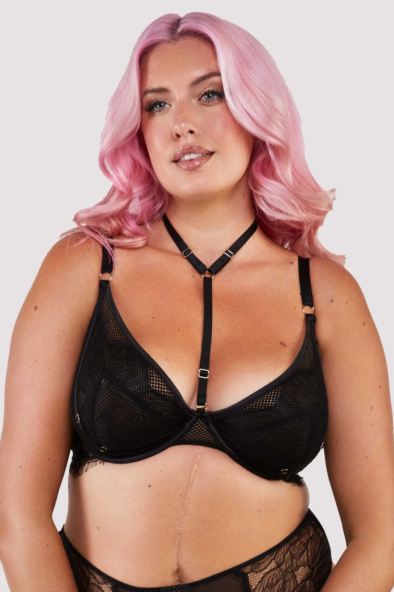 Black lacy fishnet plunge bra with gold hardware.