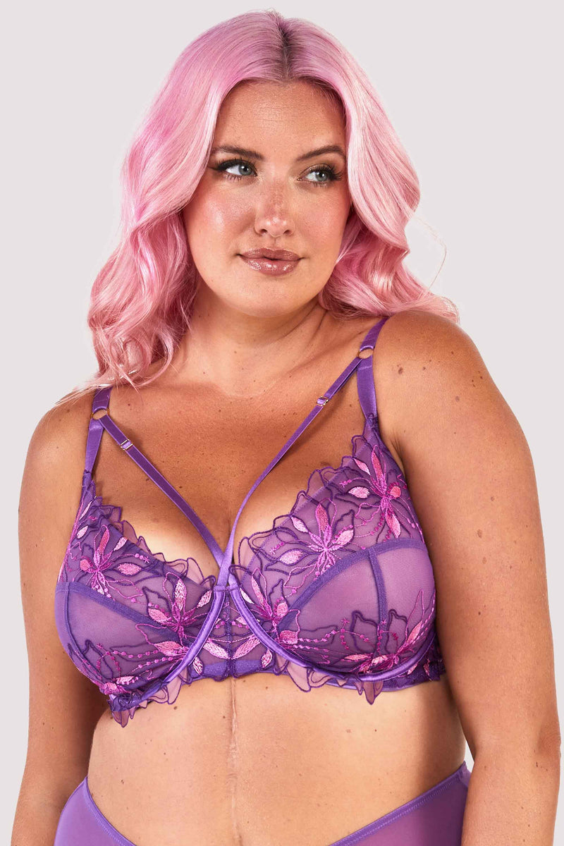 Mesh purple bra embroidered with a pink and purple floral design, with satin caging over the bust.