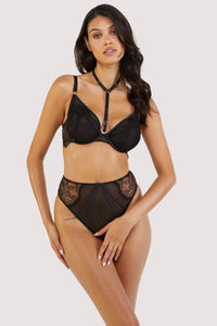 Black panelled mesh and lace crotchless thong with lace detailing, seen with a black harness bra.