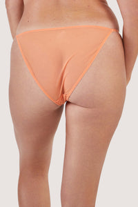 Back view of orange mesh high-waisted brief with lacey blue-lilac detailing on the front.