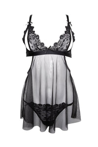 Cutout of a black babydoll dress with lace and peephole cutouts on the bust and a flowing mesh dress with matching thong.
