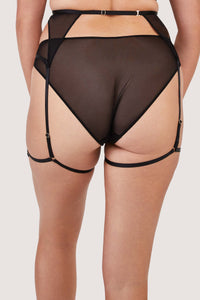 Back view of a Black lacy suspender belt with gold hardware.