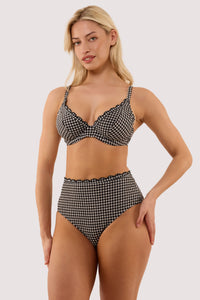 Model wears a margot black & white gingham scallop trim high waist bikini briefs with textured gingham fabric, high-waist, high-leg style with matching bikini top.