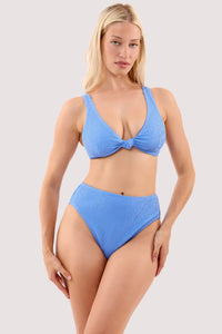 Model selene marine blue crinkle high waist bikini bottom with a matching bikini top.