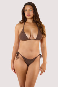 Model wearing metallic bronze bikini with glitter finish, triangle bra and string briefs.