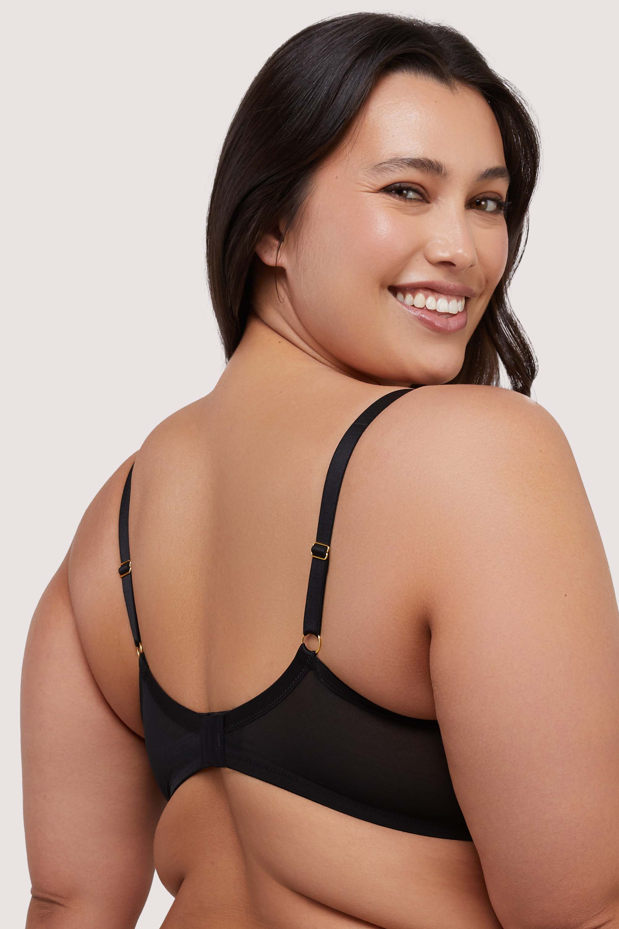 model shows black mesh hook and eye fastening back