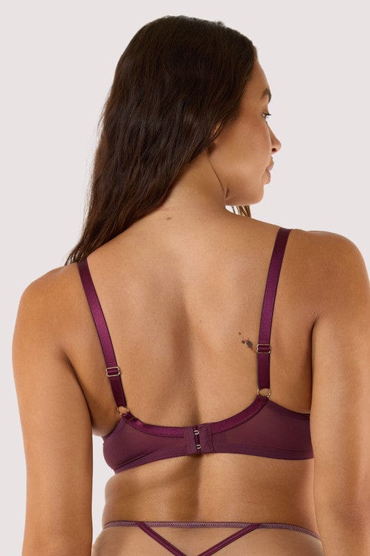 Model shows the back of a wine plunge bra with hook and eye closure, with adjustable straps.