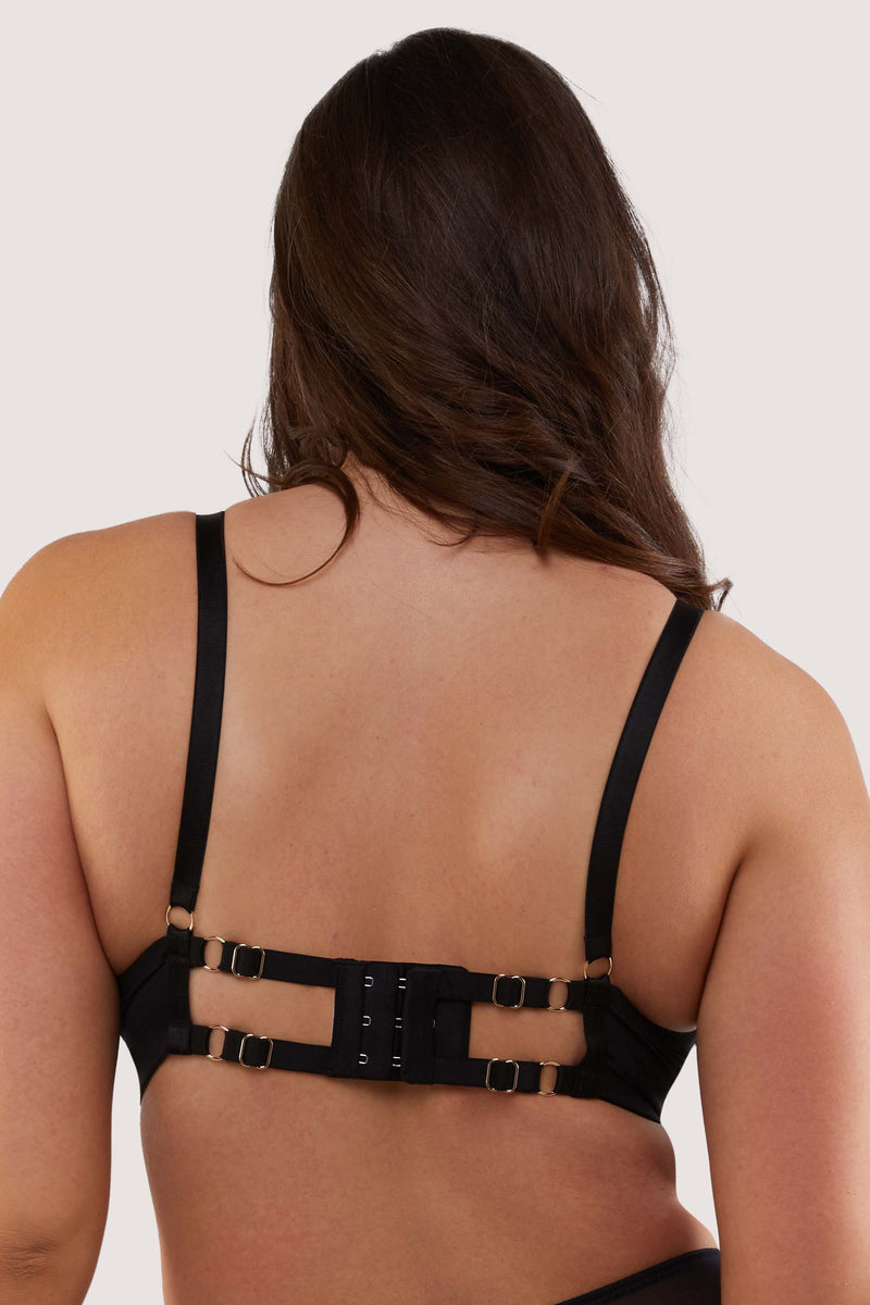 model shows black harness strap back with hook and eye fastening