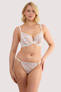 Model wears a willow white floral embroidery bra featuring sheer mesh with white floral embroidery and underwired cups, with a matching embroidery suspender belt and thong.