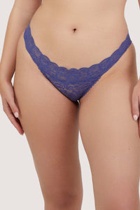 model wearing a space dust blue lace thong with scalloped trim and floral lace pattern, designed for everyday comfort.