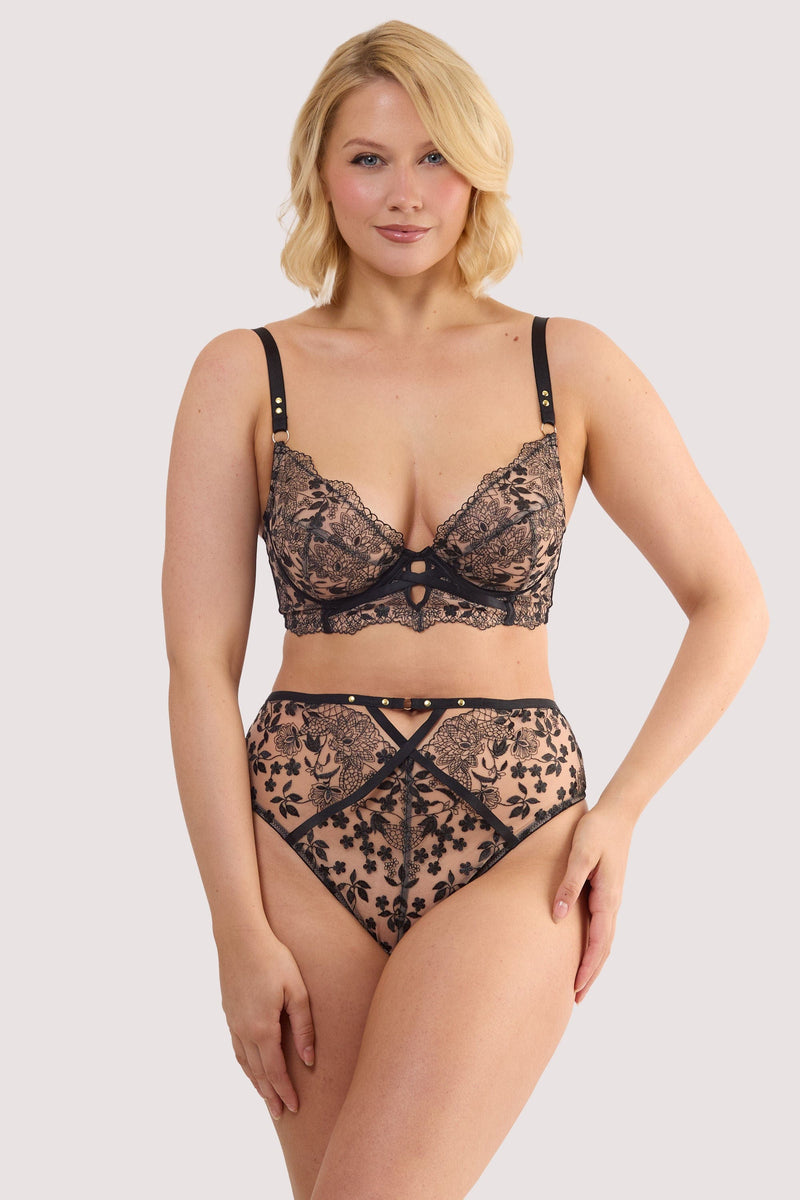 Model wears a cindy black floral embroidery high waist thong with scalloped lace edging, with a matching embroidery bra and thong.