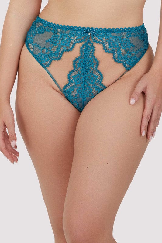 Model wears a teal eyelash lace high waist thong with velvet bow with pearl charm and nude mesh with teal eyelash lace panels.