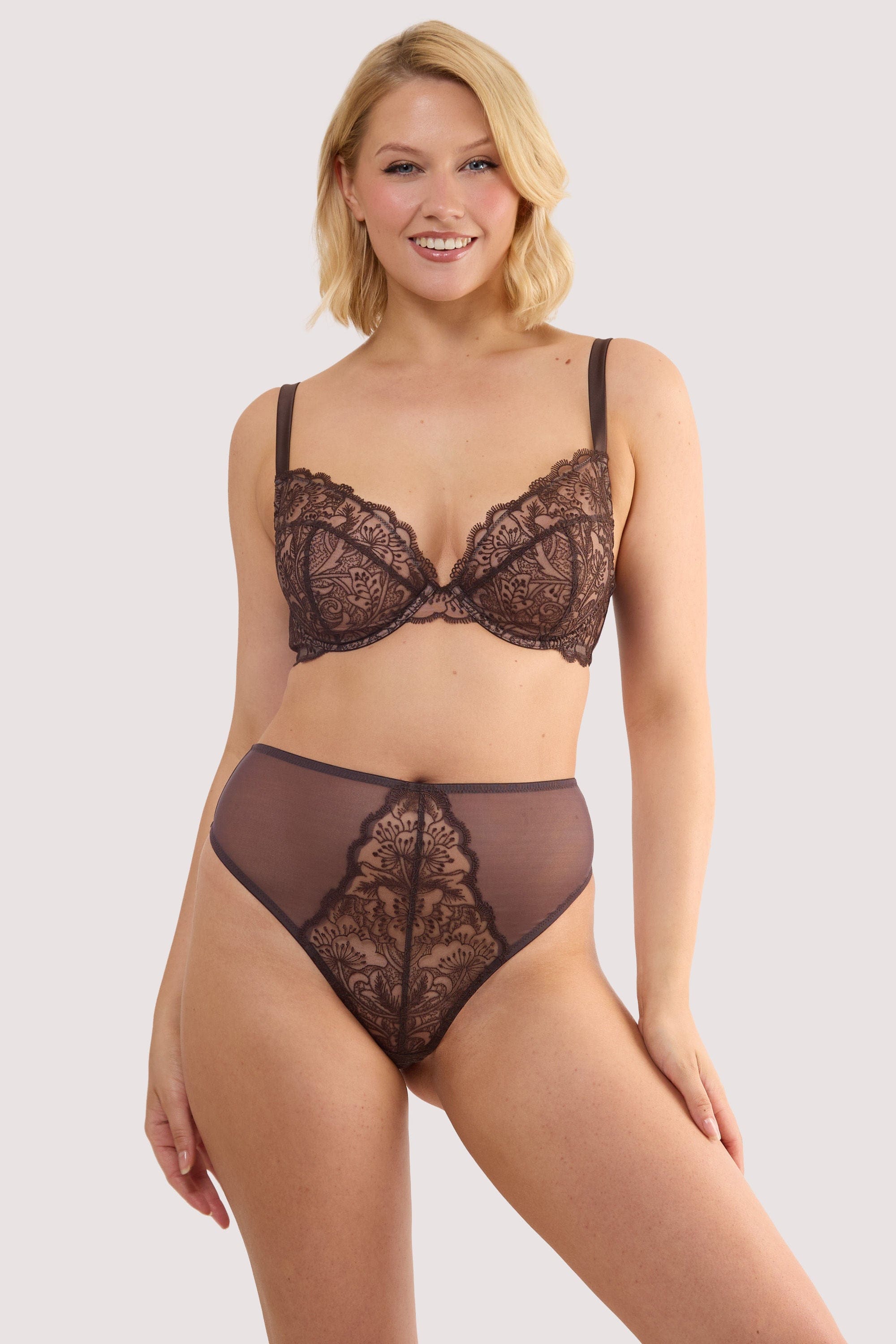 Model wears a sierra brown embroidery high waist thong with sheer mesh with bronze embroidery, with a matching plunge bra.
