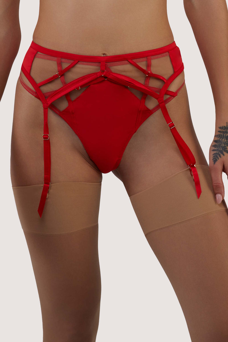 model wears red Ramona high waisted thong with red strap suspender