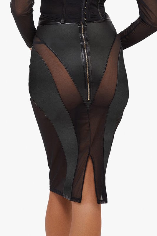 Model shows the back of a black vegan leather mesh insert pencil skirt with gold zip detail and below the knee cut with back split.