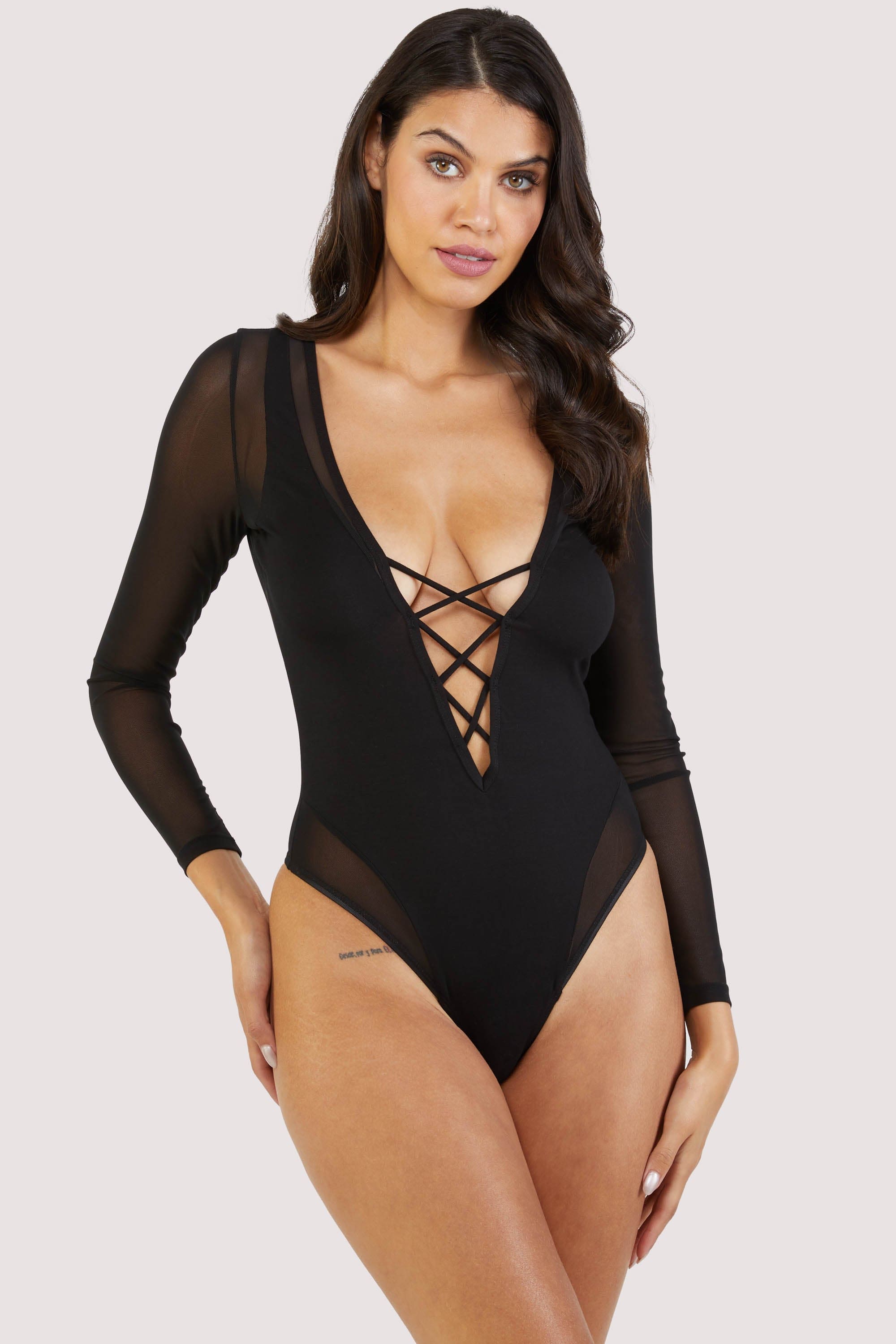 Black bodysuit with sheer arms