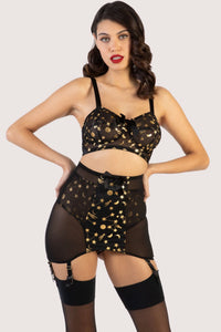 model wears Solar black and gold cosmic print bullet bra with high waist brief and girdle with suspender