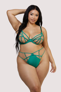 model wears green mesh plunge bra and high waisted thong