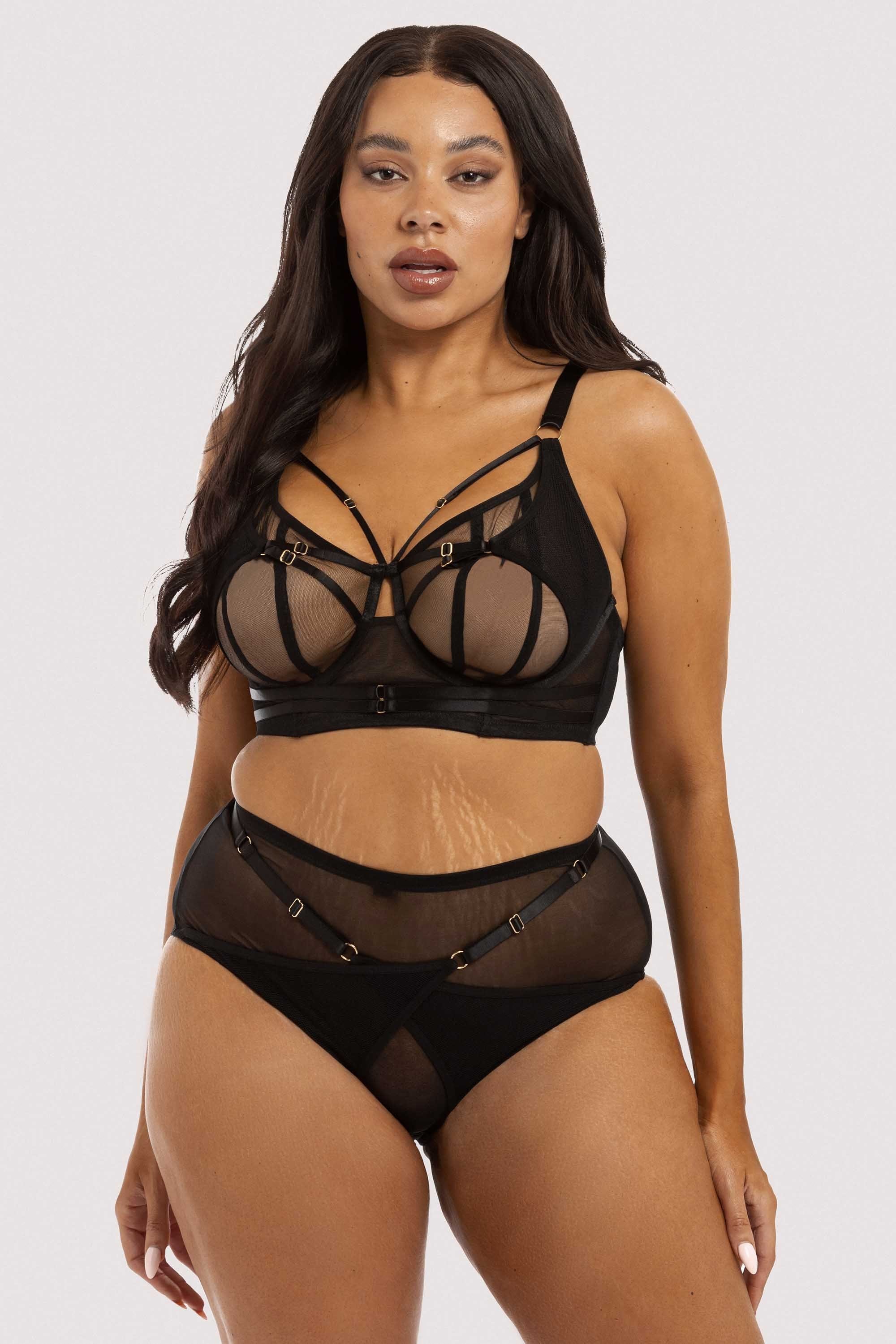 model wears Eddie Black Crossover bra with lingerie set